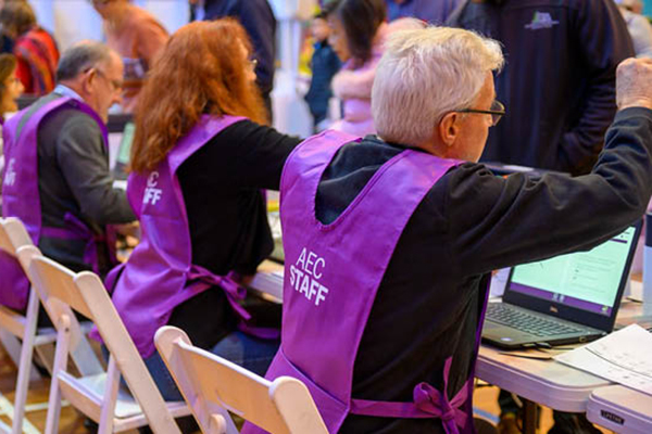 Australian Electoral Commission staff working at a polling booth.