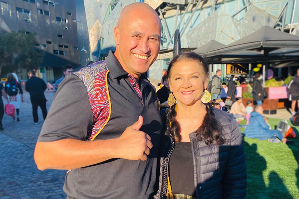 Jez-and-aunty-deb - 600 x 400 Aboriginal inclusion officer Jeremy Nikora and Aunty Deb Mellett posing for a photo at Federation Square
