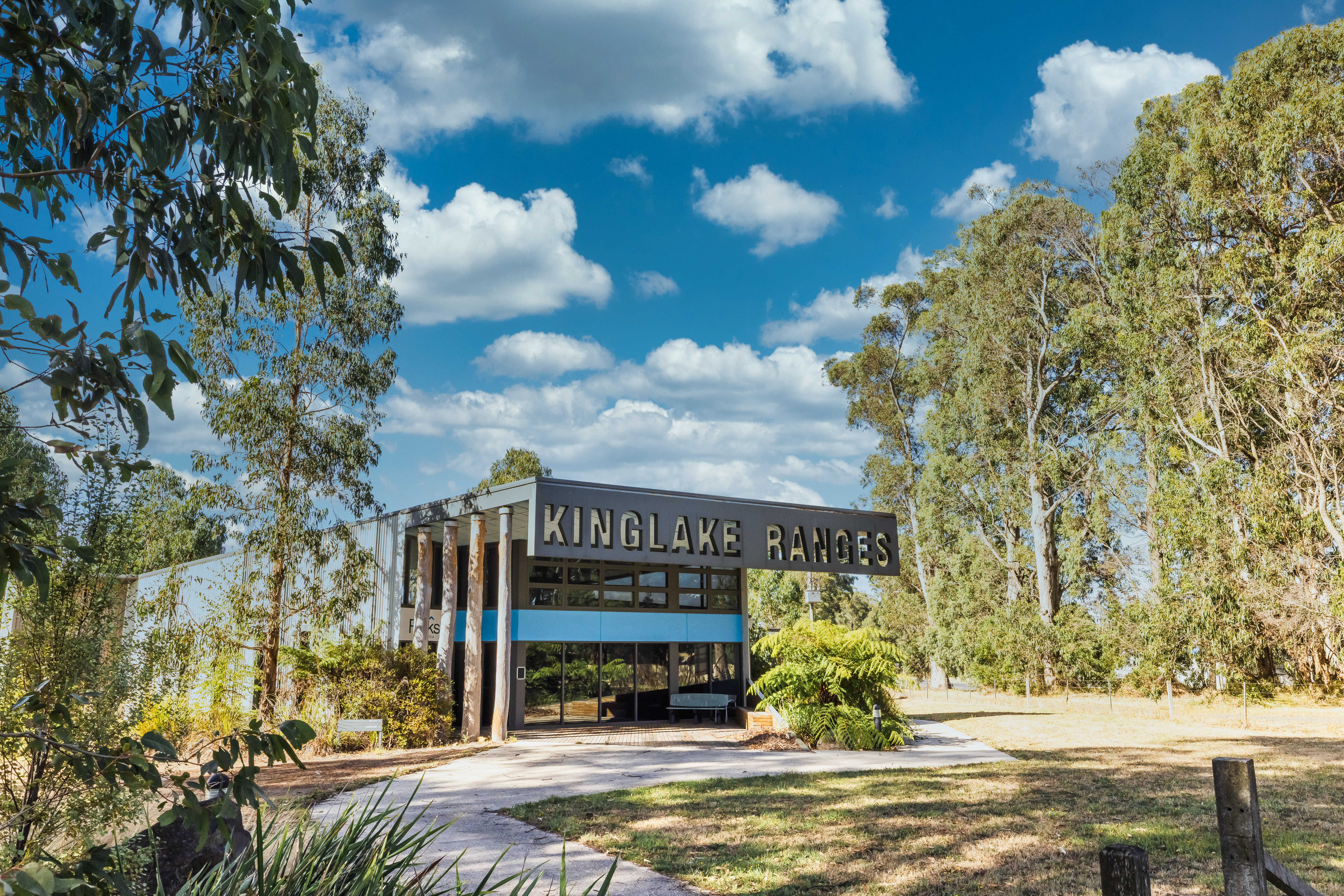 Kinglake Ranges centre surrounded by native bushland under a blue sky
