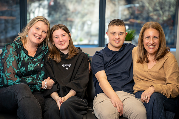 My right my vote 600x400 Mother Julieanneand her daughter Abbey, and Harry and his mum Alex sitting on a couch together.
