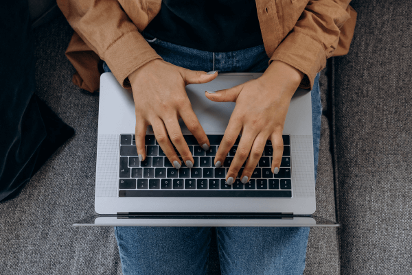 Person typing on a laptop